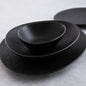 Fosil porcelain oval dinner plate, irregular shape, 28 x 24 cm. Various colors (6 units)
